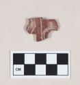 Polished Monochrome Ware, Red, body sherd with partial pierced holes, incised designs