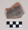 Polished Monochrome Ware, Orange, body sherd, partially blackened