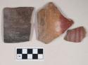 Brown-Black Pattern Polish Ware, rim sherd; Red-on-Natural Painted Ware, body sherds