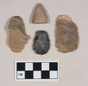 Chipped stone, bifacially worked objects, including one likely projectile point