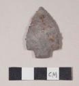 Chipped stone, projectile point, stemmed, possible serration along parts of edges