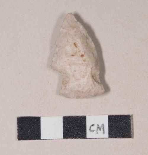 Chipped stone, projectile point, corner-notched; one side appears to have been retouched