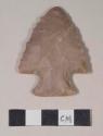 Chipped stone, projectile point, corner-notched, serrated