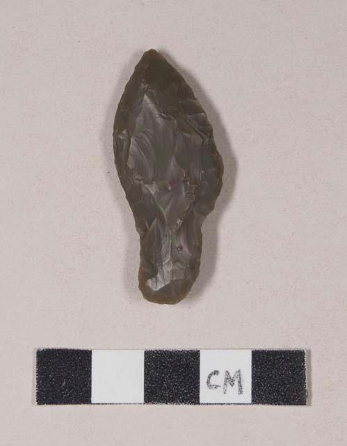 Chipped stone, projectile point, stemmed, asymmetrical