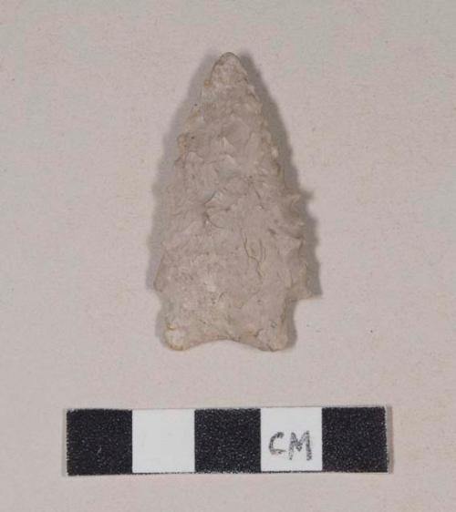 Chipped stone, projectile point, corner-notched, serrated