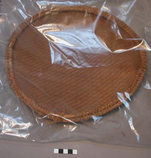 Round  basketry manioc strainer, vegetable fiber