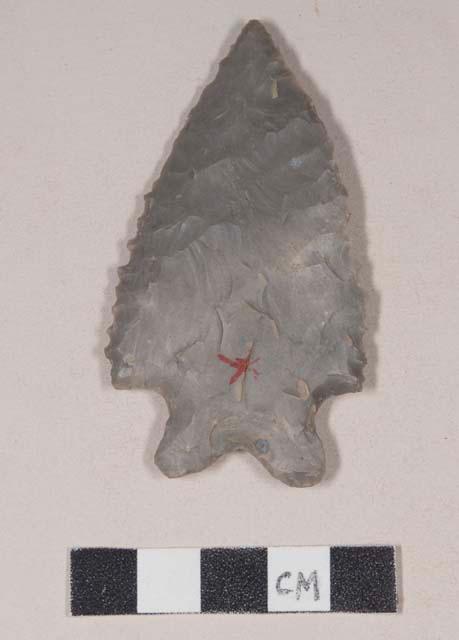 Chipped stone, projectile point, corner-notched, bifurcate base, serrated