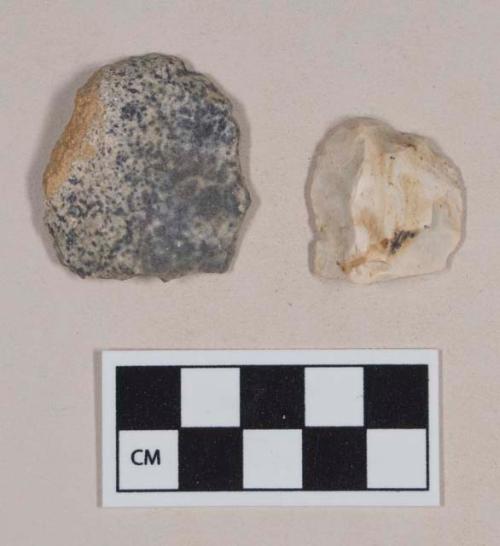 Chipped stone, flint scrapers, one with cortex