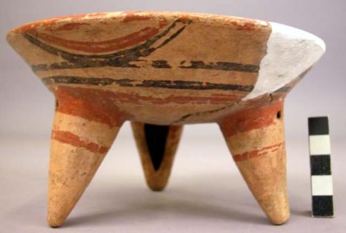 Small polychrome pottery tripod bowl