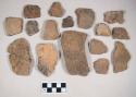 Coarse red bodied earthenware body and rim sherds