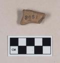 Coarse red bodied earthenware figurine sherd, undecorated