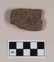 Red bodied earthenware figurine sherd, human in appearance