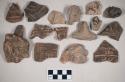 Red bodied earthenware figurine sherds, most human in appearance, some with red pigment