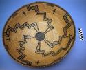 Medium basket tray, coiled. Made of bear grass and devil's claw. Step design w