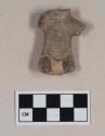 Red bodied earthenware figurine sherd, human in appearance