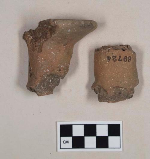 Coarse earthenware cylindrical sherds, with flat surface at both ends, possibly foot of a vessel