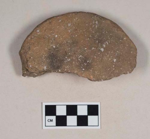 Coarse earthenware disk sherd, undecorated, shell temper