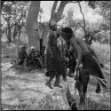 Group of women and girls playing khù n≠haru (skip-rope), with ≠Nisa skipping