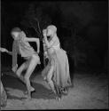 Two boys dancing in a night dance