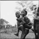 Two boys playing piggy-back