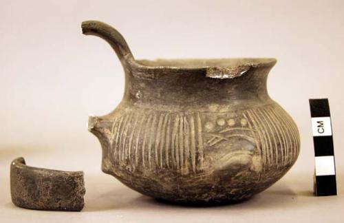 Black ware handled cup- incised design