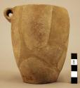 Jar (11 sherds) with spool or bobbin-shaped handle-Matera I plain ware