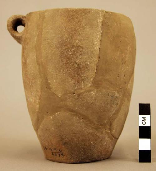 Jar (11 sherds) with spool or bobbin-shaped handle-Matera I plain ware