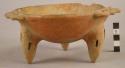 Lost color ware tripod bowl - 3 handles; simulared rattle legs and linear design
