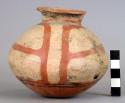 Pottery jar, base red, upper zone white with black ornamentation