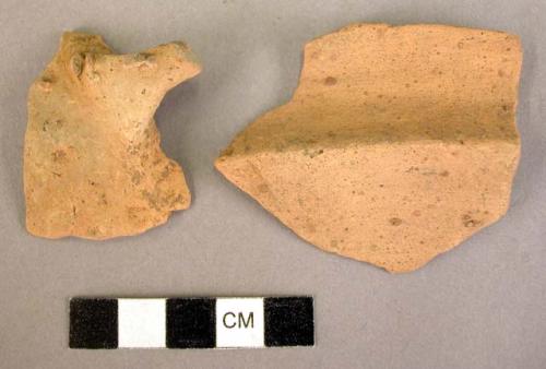 12 potsherds - red fluted ware (undecorated)