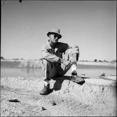 Nicholas England sitting on the edge of a pan