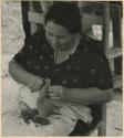 Eliza Gordon scraping a pot