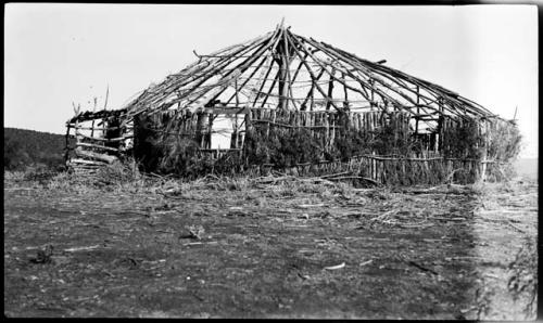 Wooden framework for round structure, probably brush dance house