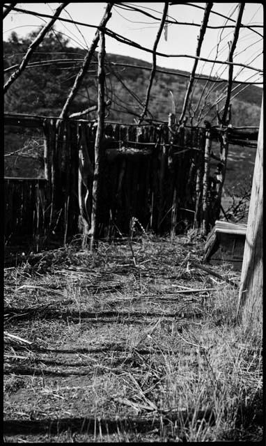 Wooden framework for round structure, probably brush dance house, detail