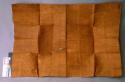 Undecorated light brown tapa cloth, wavy texture (made by pounding with square b