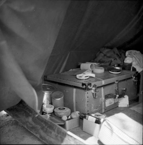 Cot and film equipment inside an expedition tent