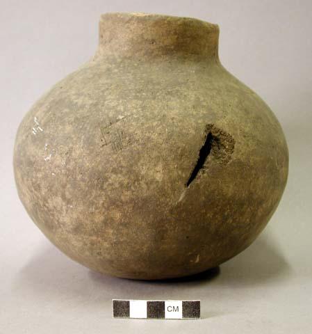 Ceramic vessel, short neck, cracked and one perforation