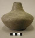 Ceramic vessel, long neck, broken at rim,
