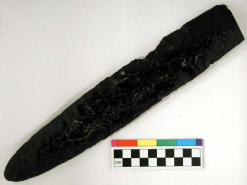 Chipped implement; chipped from black obsidian