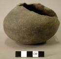 Ceramic partial vessel, missing neck and body sherds, plain