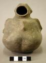 Ceramic vessel, hooded effigy jar, human with protruding spine.