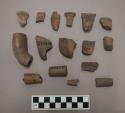 Ceramic, pipe fragments, bowls, elbows, stems, mouthpieces, some have incised and punctate designs