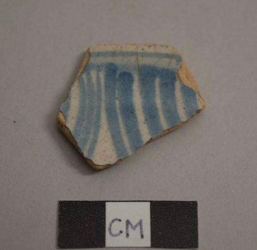 Earthenware, tin-glazed, blue on white; body sherds, buff paste, handpainted geometric design