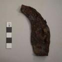 Ferrous, ox shoe fragment; heavily corroded