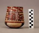 Bowl painted in polychrome with mythical figures, interlocking snakes, quadrants