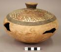 Polychrome pottery jar with cover