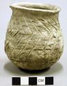 Ceramic miniature jar, corrugated & incised, flared lip
