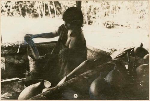 Woman making chicha