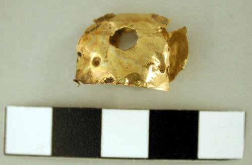 Fragment of thin gold object