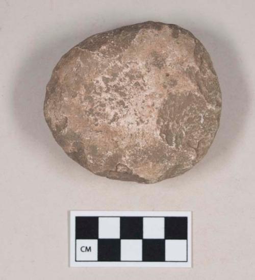 Ground stone, possibly pitted